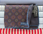 Holliday &amp; Brown
Hand-rolled&nbsp;&nbsp;
Holliday &amp; Brown for Cruciani &amp; Bella
100% Silk
Blue, Red, Light Blue and Brown
Double Faces
Motif&nbsp; Pocket Square
Handmade in Italy

32 cm X 32 cm
#10439