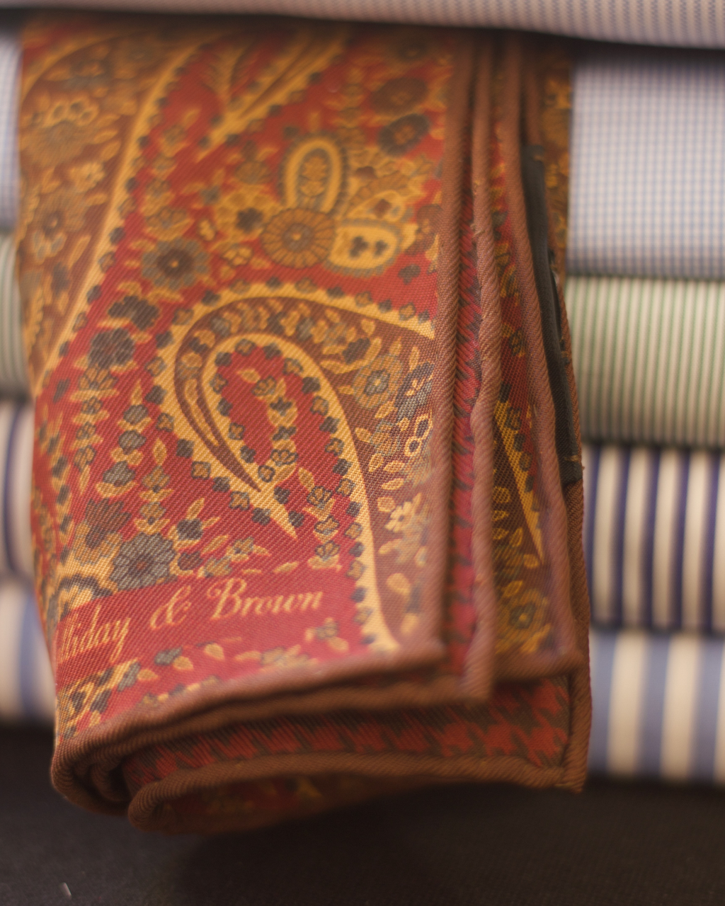 Holliday & Brown Hand-rolled   Holliday & Brown for Cruciani & Bella 100% Silk Wine and Brown Double Faces Patterned  Motif  Pocket Square Handmade in Italy 32 cm X 32 cm