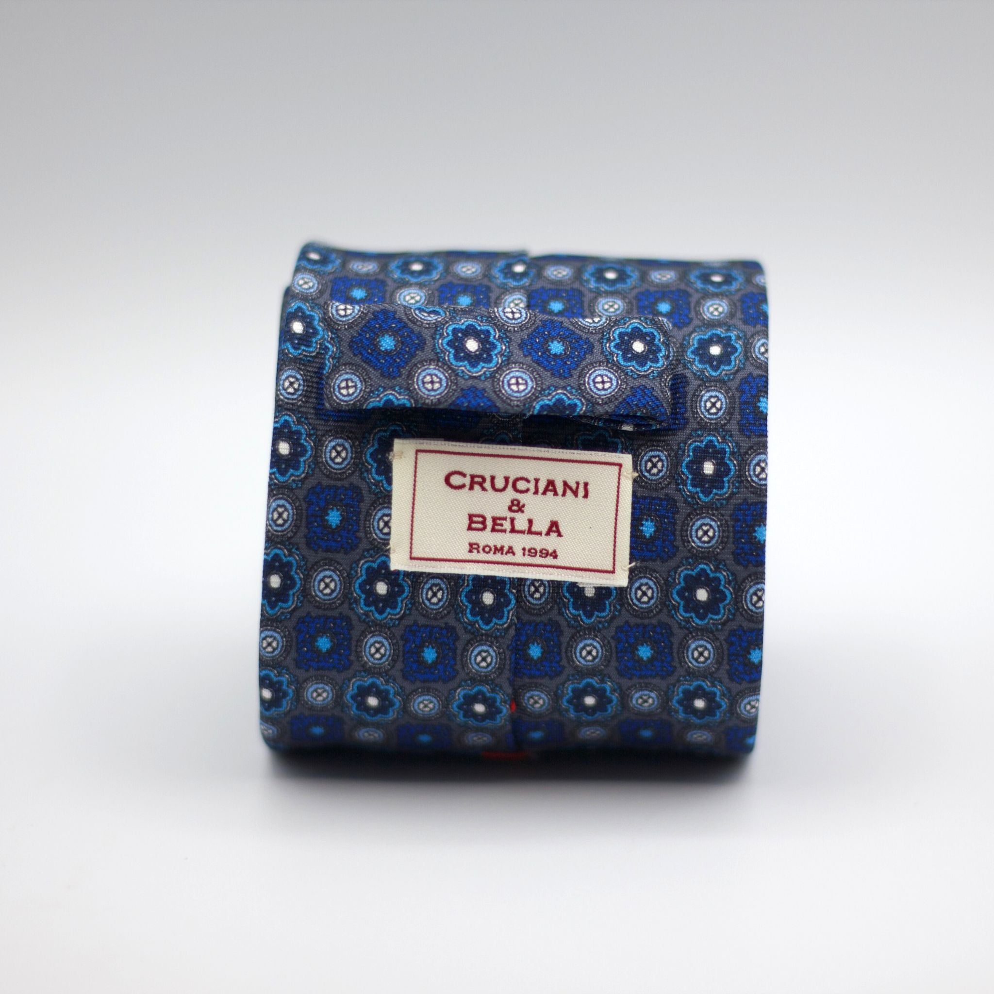 Cruciani & Bella 100% Silk Printed Self-Tipped Grey, Blue, light blue and white motif Tie Handmade in Rome, Italy. 8 cm x 150 cm