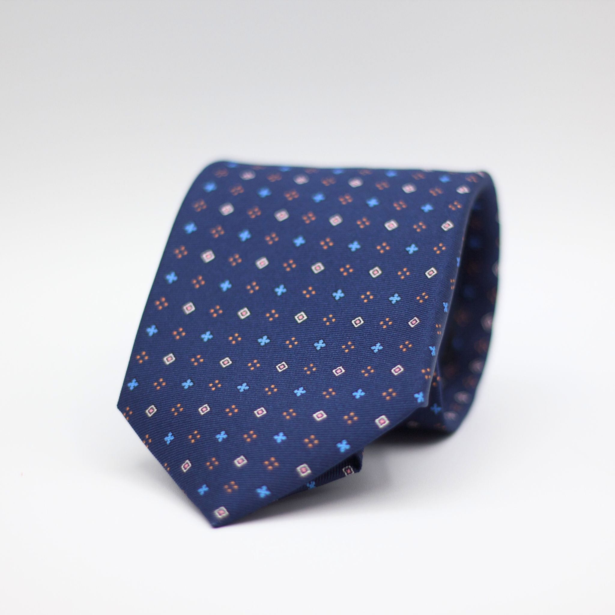 Holliday & Brown for Cruciani & Bella 100% printed Silk Self Tipped Blue, with White, Light Blue and Pink motif tie  Handmade in Italy 8 cm x 150 cm