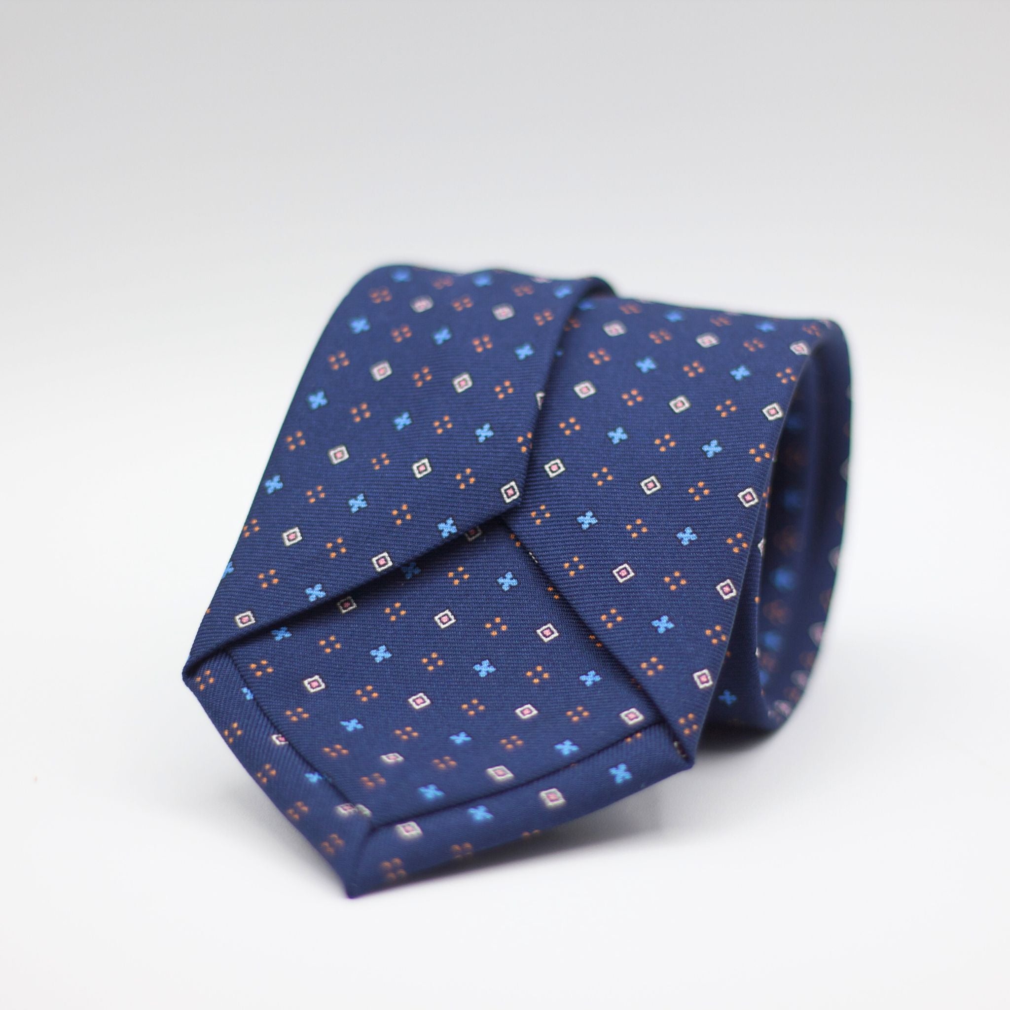 Holliday & Brown for Cruciani & Bella 100% printed Silk Self Tipped Blue, with White, Light Blue and Pink motif tie  Handmade in Italy 8 cm x 150 cm
