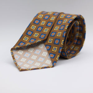 Cruciani & Bella  100% Printed Madder Silk  Italian fabric  Unlined tie Khaki, Blue, light Blue, Yellow and Orange motif Handmade in Italy 8 cm x 150 cm