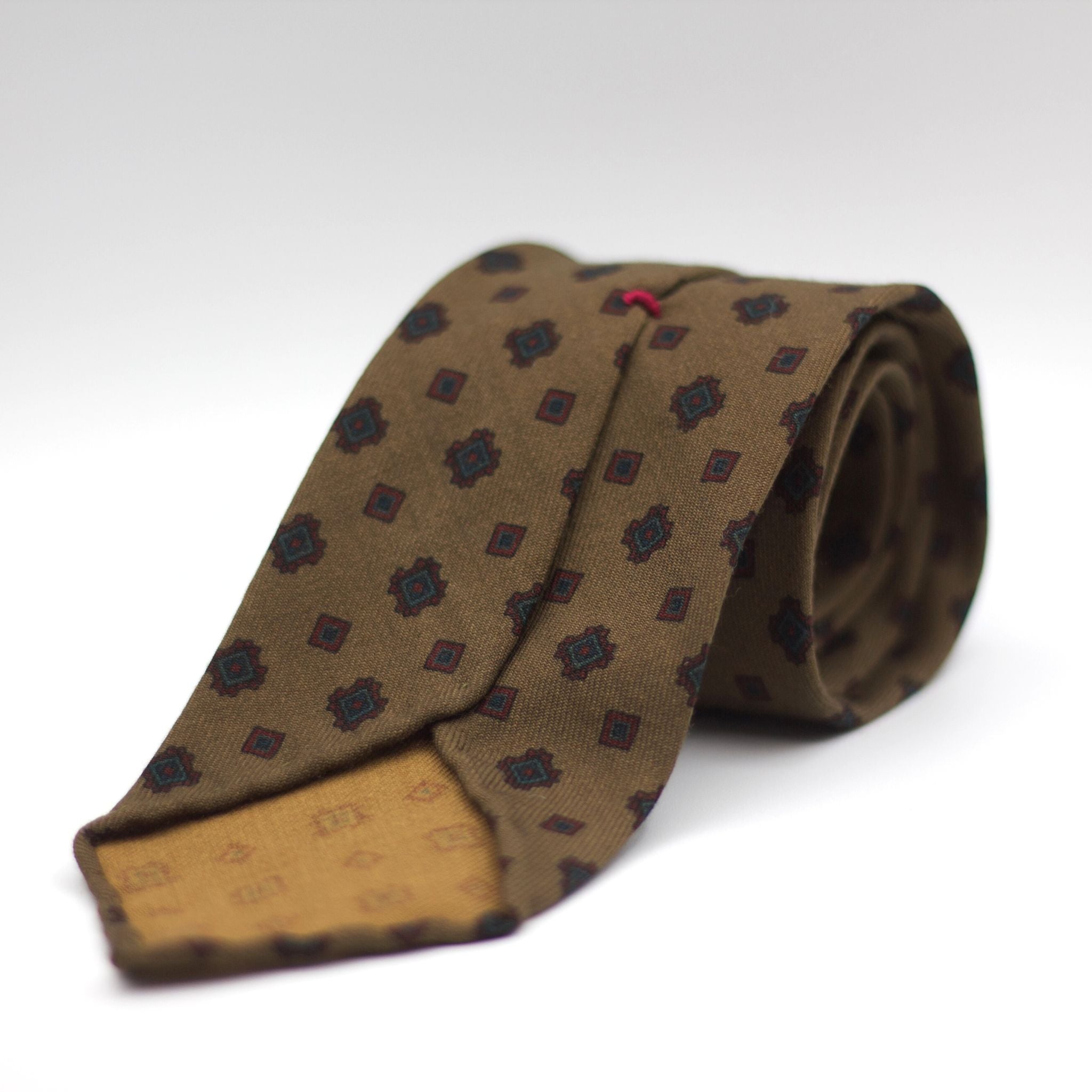 Cruciani & Bella 100%  Printed Wool  Unlined Hand rolled blades Light  Brown, Burgundy and Blue Motifs Tie Handmade in Italy 8 cm x 150 cm