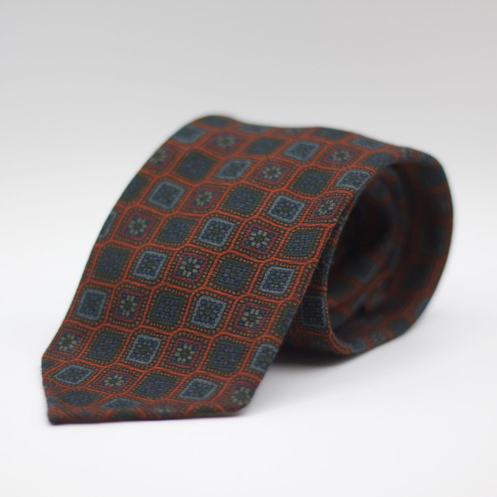 Cruciani & Bella 100%  Printed Wool  Unlined Hand rolled blades Orange, Blue and Grey Motif Tie Handmade in Italy 8 cm x 150 cm