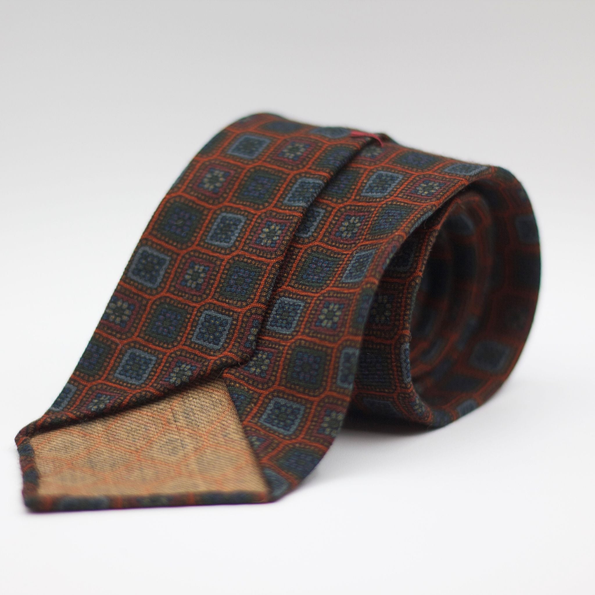 Cruciani & Bella 100%  Printed Wool  Unlined Hand rolled blades Orange, Blue and Grey Motif Tie Handmade in Italy 8 cm x 150 cm