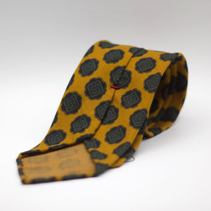 Cruciani & Bella 100%  Printed Wool  Unlined Hand rolled blades Yellow, Green and Dark Brown Motifs Tie Handmade in Italy
