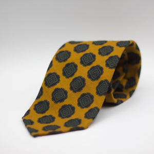 Cruciani & Bella 100%  Printed Wool  Unlined Hand rolled blades Yellow, Green and Dark Brown Motifs Tie Handmade in Italy