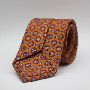 Cruciani & Bella 100% Silk Printed Self-Tipped Rust, red, yellow, blue and light blue motif Tie Handmade in Rome, Italy. 8 cm x 150 cm