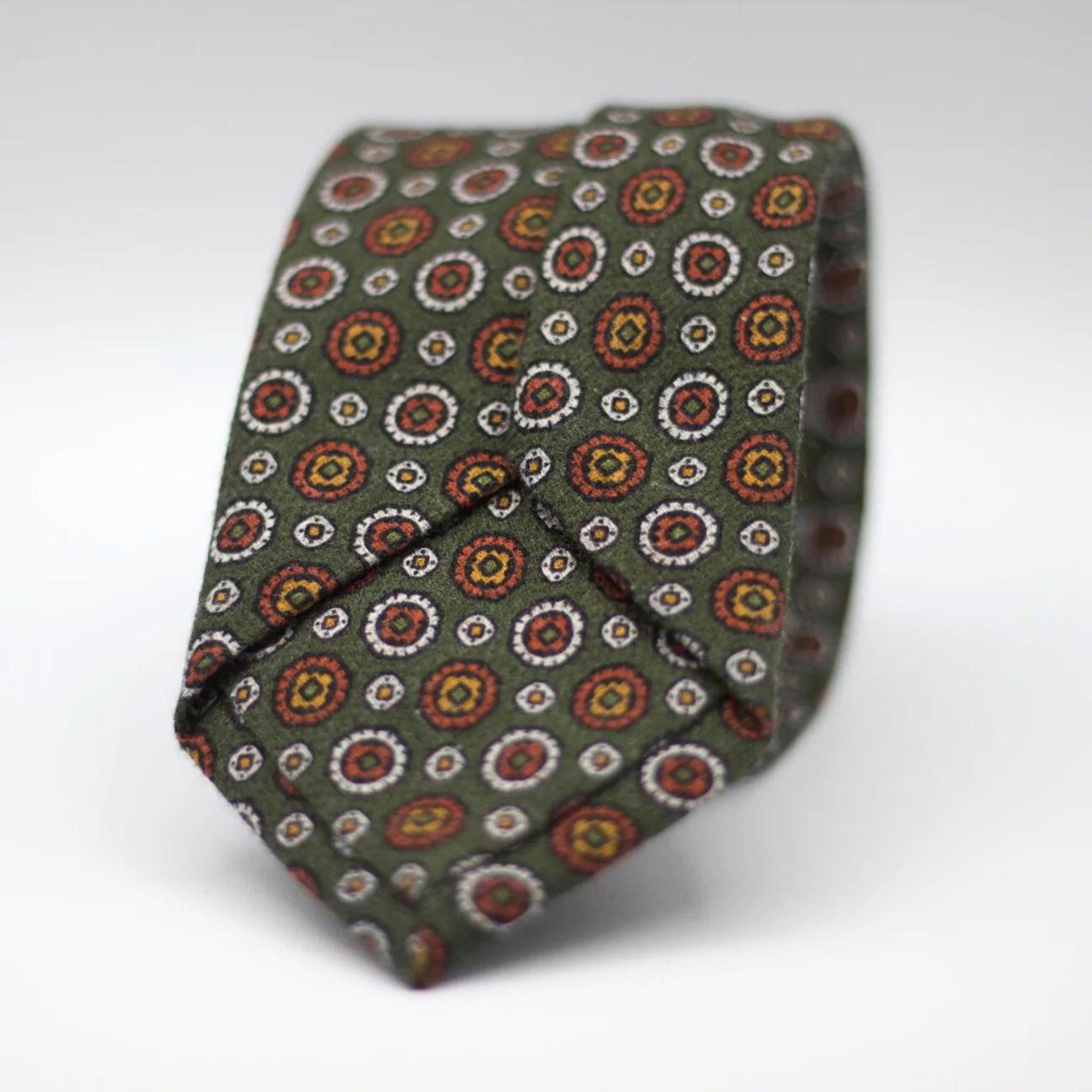 Green with Orange, Yellow and White motif tie&nbsp;