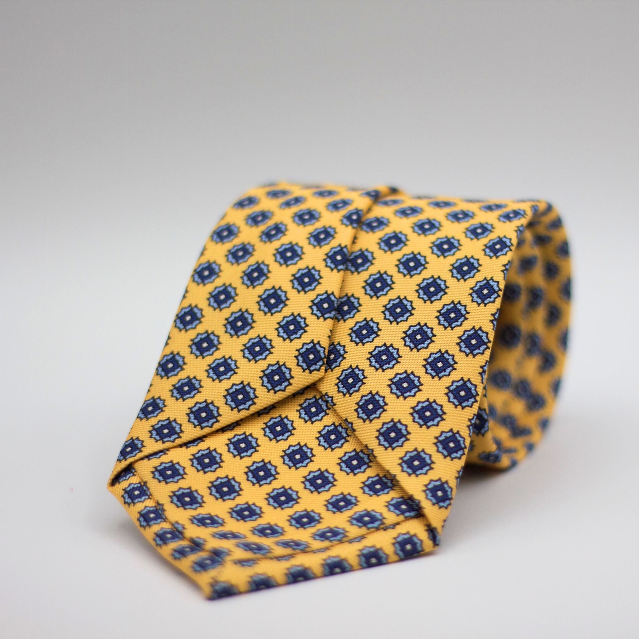 Holliday & Brown for Cruciani & Bella 100% printed Silk Self Tipped Yellow with Navy and Light Blue motif tie Handmade in Italy 8 cm x 150 cm