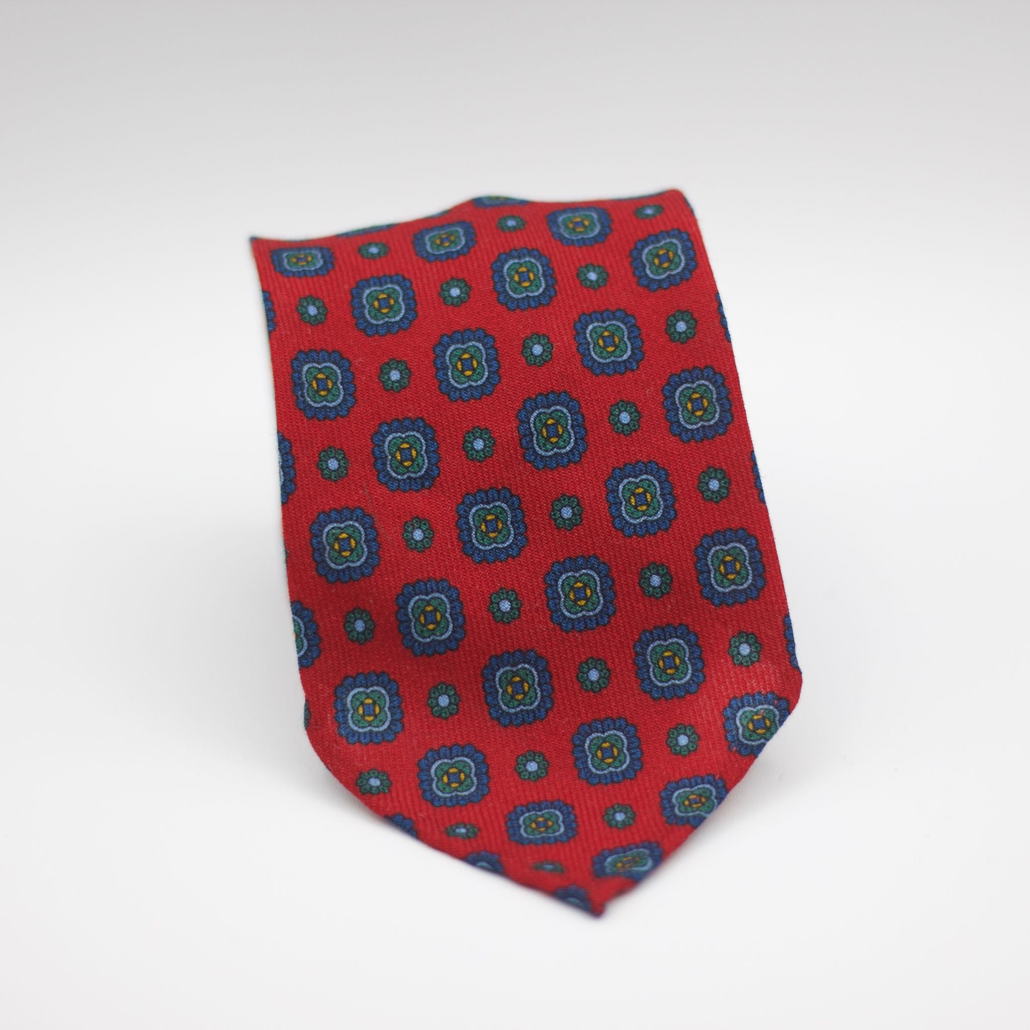 Cruciani & Bella 100%  Printed Wool  Unlined Hand rolled blades Red, Green, Blue and light Blue  Motif Tie Handmade in Italy 8 cm x 150 cm #7287