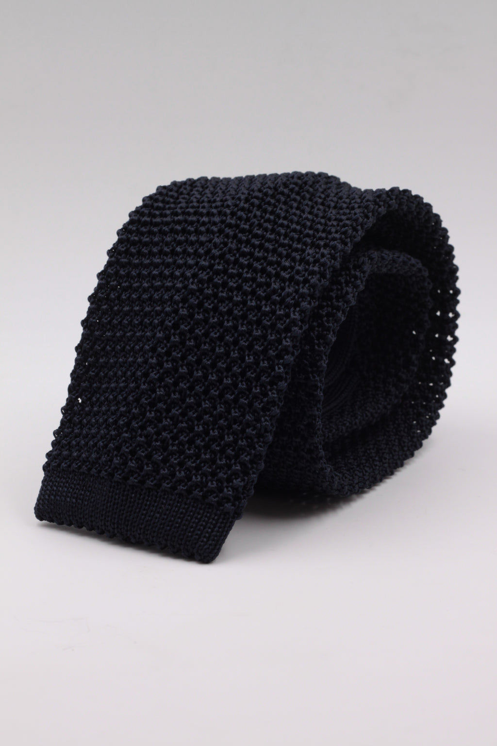 Navy blue knitted tie