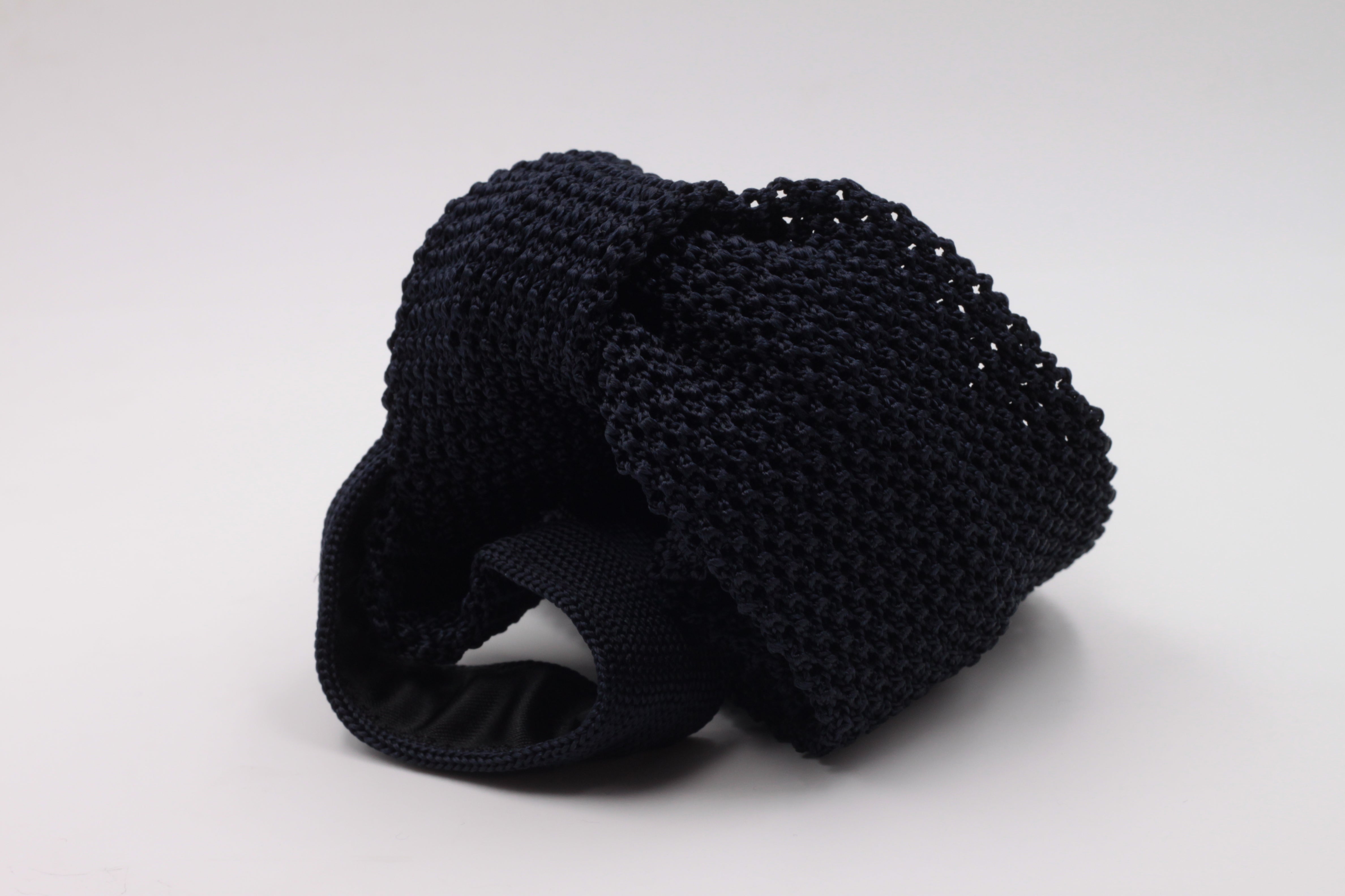 Navy blue knitted tie