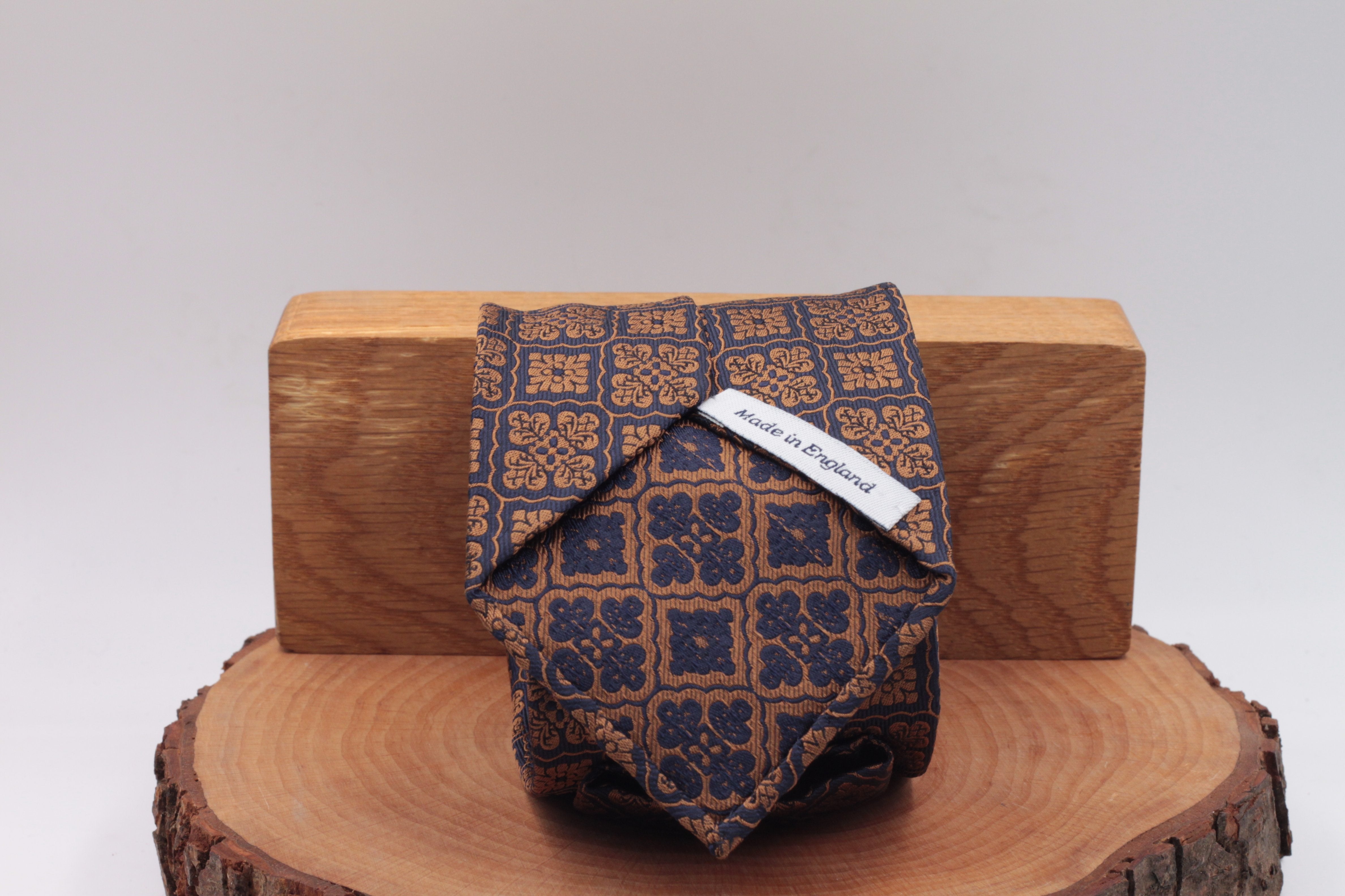 Gold end Blue motif tie