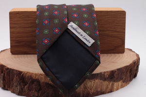 Brown, green, red and royal blue motif tie