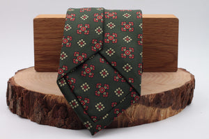 Bottle green, red and cream motif tie