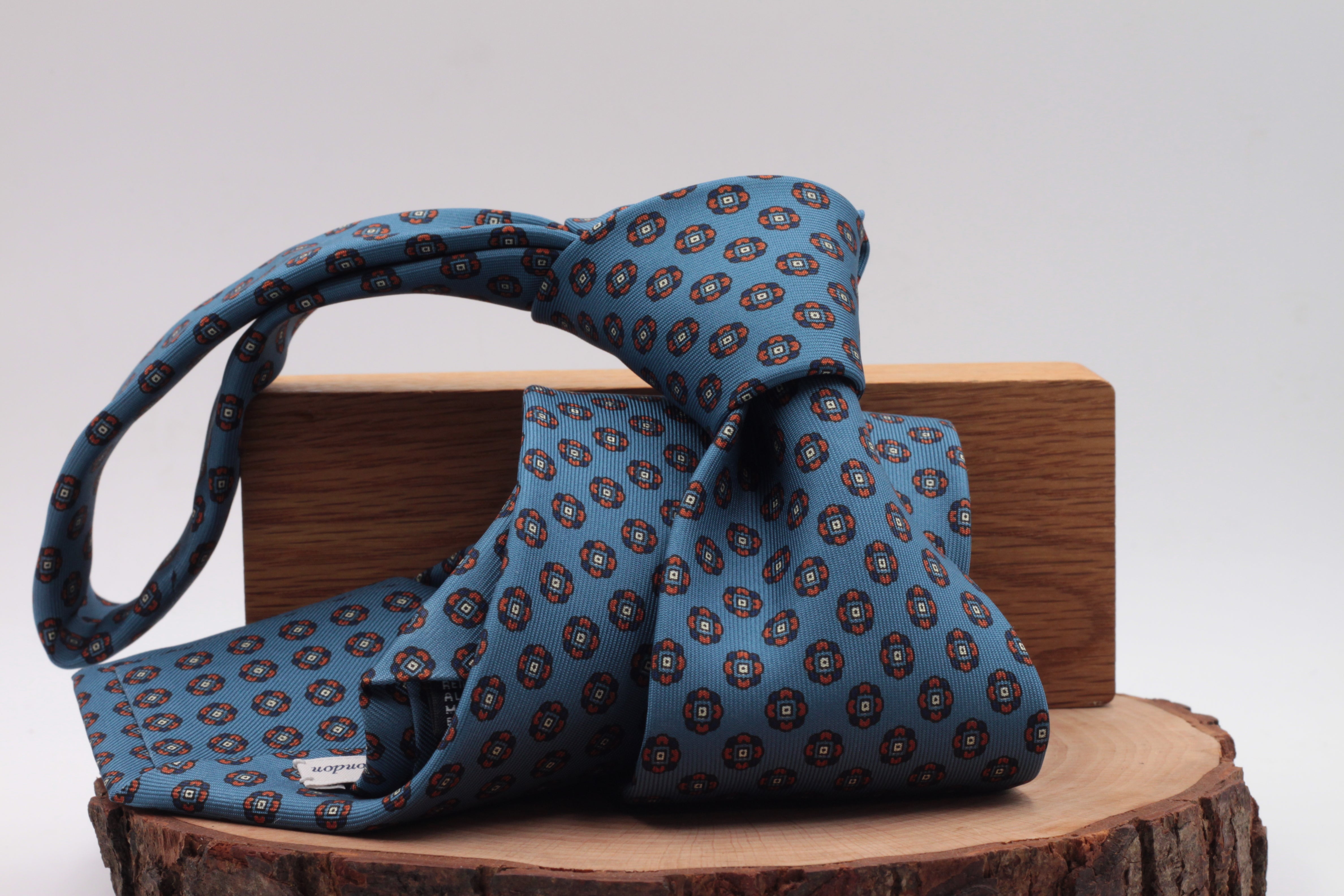 Royal blue, blue navy and orange motif tie