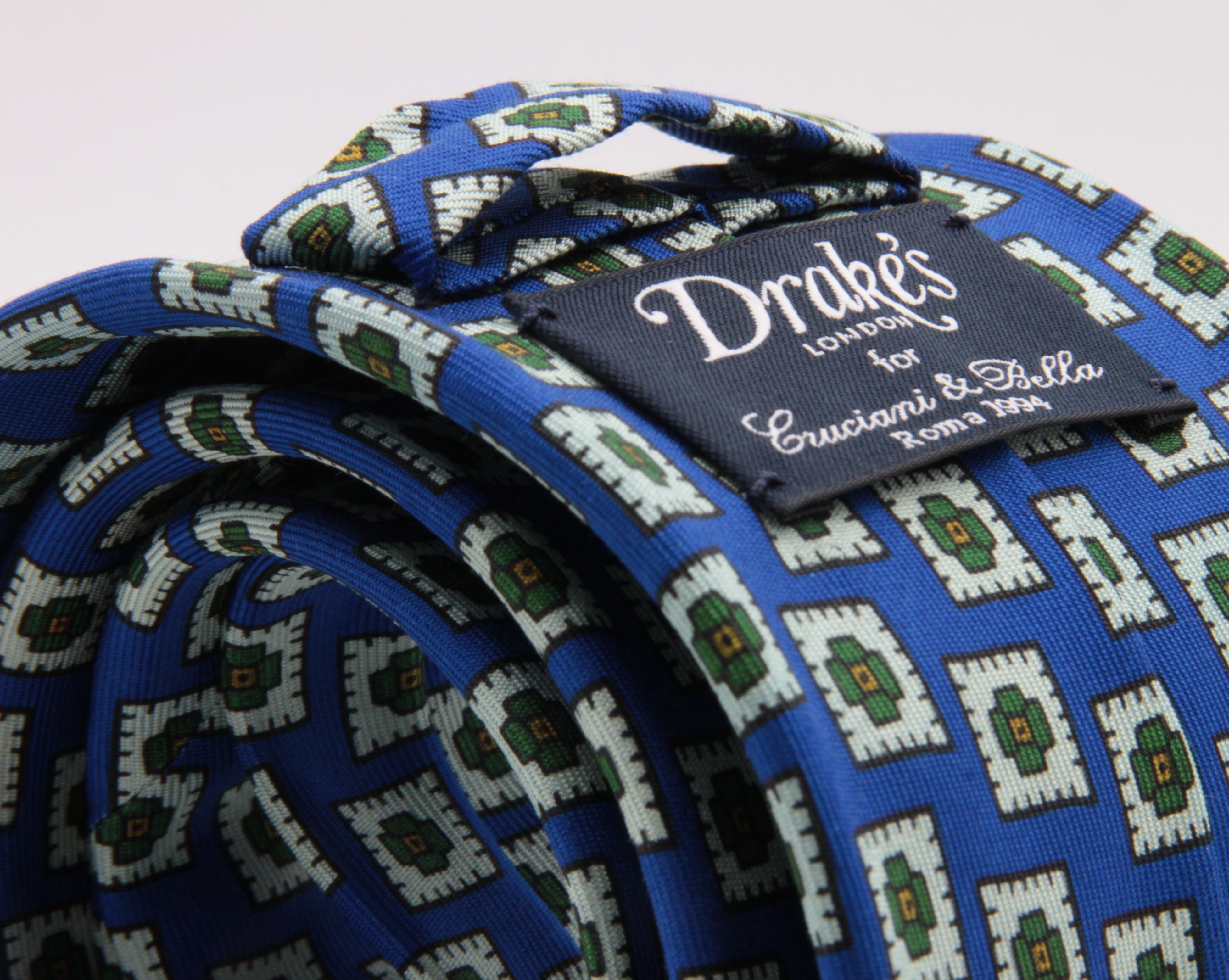 Drake's for Cruciani e Bella 100%  Printed Silk Tipped Light Blue, White, Green and Orange Medallion tie 36 oz Handmade in London, England 8 cm x 150 cm #4590