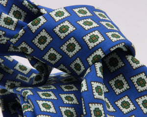 Drake's for Cruciani e Bella 100%  Printed Silk Tipped Light Blue, White, Green and Orange Medallion tie 36 oz Handmade in London, England 8 cm x 150 cm #4590