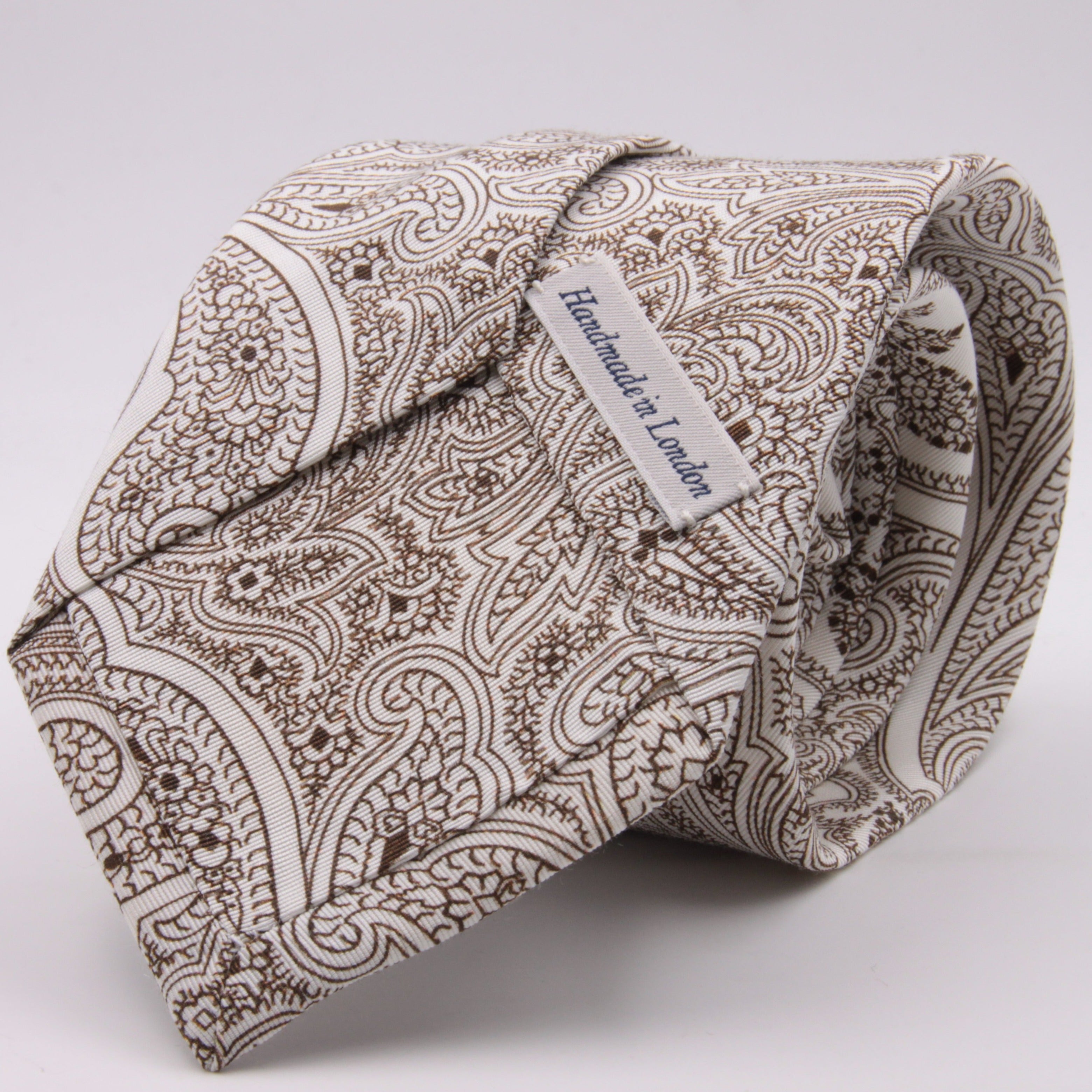 Drake's for Cruciani e Bella Printed 60% Silk 40% Cotton Self-Tipped White and Brown Paysley Motif Tie Handmade in London, England 8 cm x 149 cm #5415