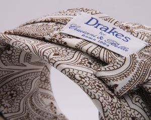 Drake's for Cruciani e Bella Printed 60% Silk 40% Cotton Self-Tipped White and Brown Paysley Motif Tie Handmade in London, England 8 cm x 149 cm #5415
