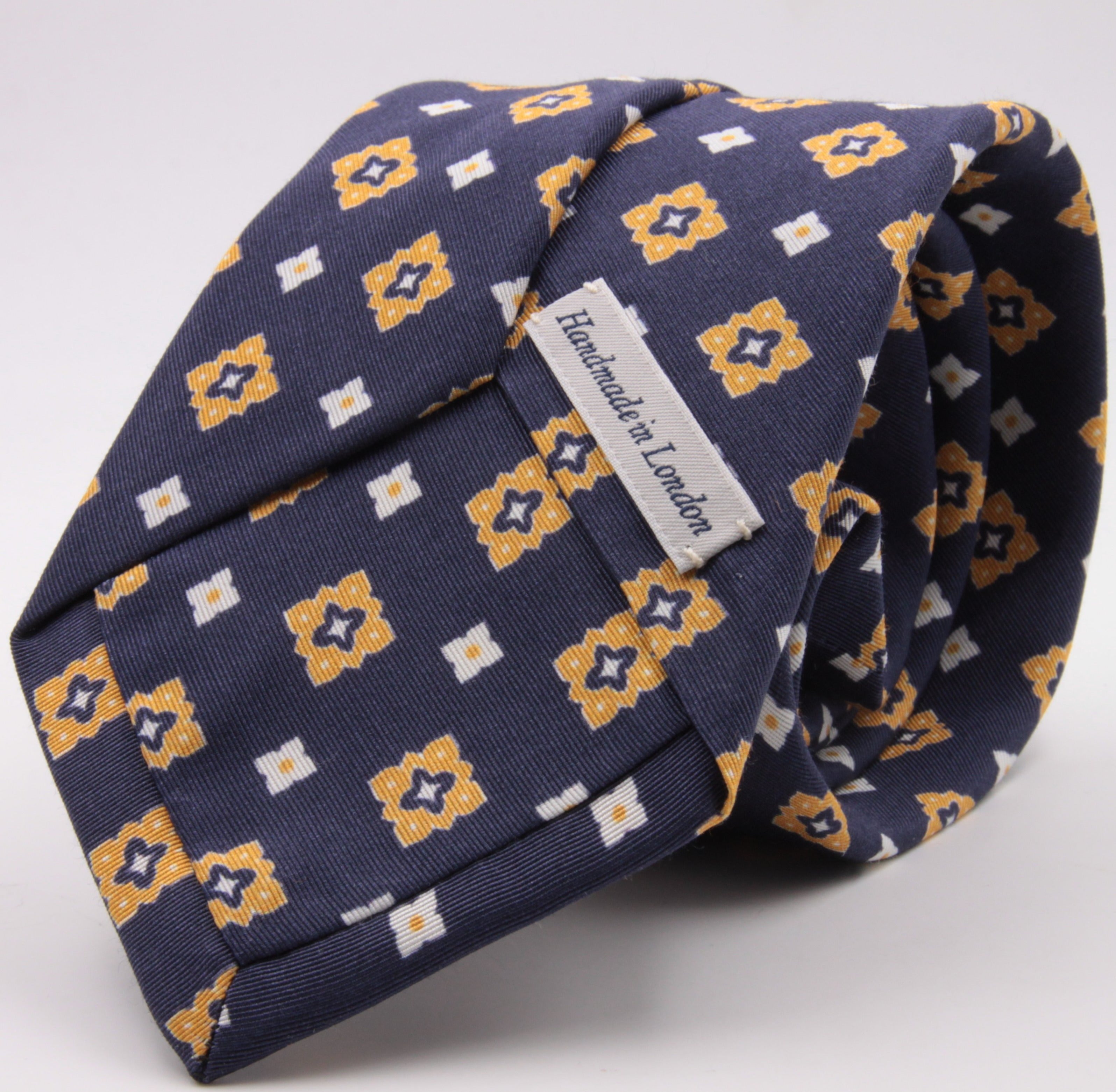 Drake's for Cruciani e Bella Printed 60% Silk 40% Cotton Self-Tipped Blue, Yellow and White Motif Tie  Handmade in London, England 8 cm x 149 cm #5430