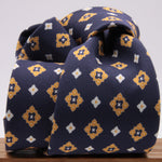 Drake's for Cruciani e Bella Printed 60% Silk 40% Cotton Self-Tipped Blue, Yellow and White Motif Tie  Handmade in London, England 8 cm x 149 cm #5430