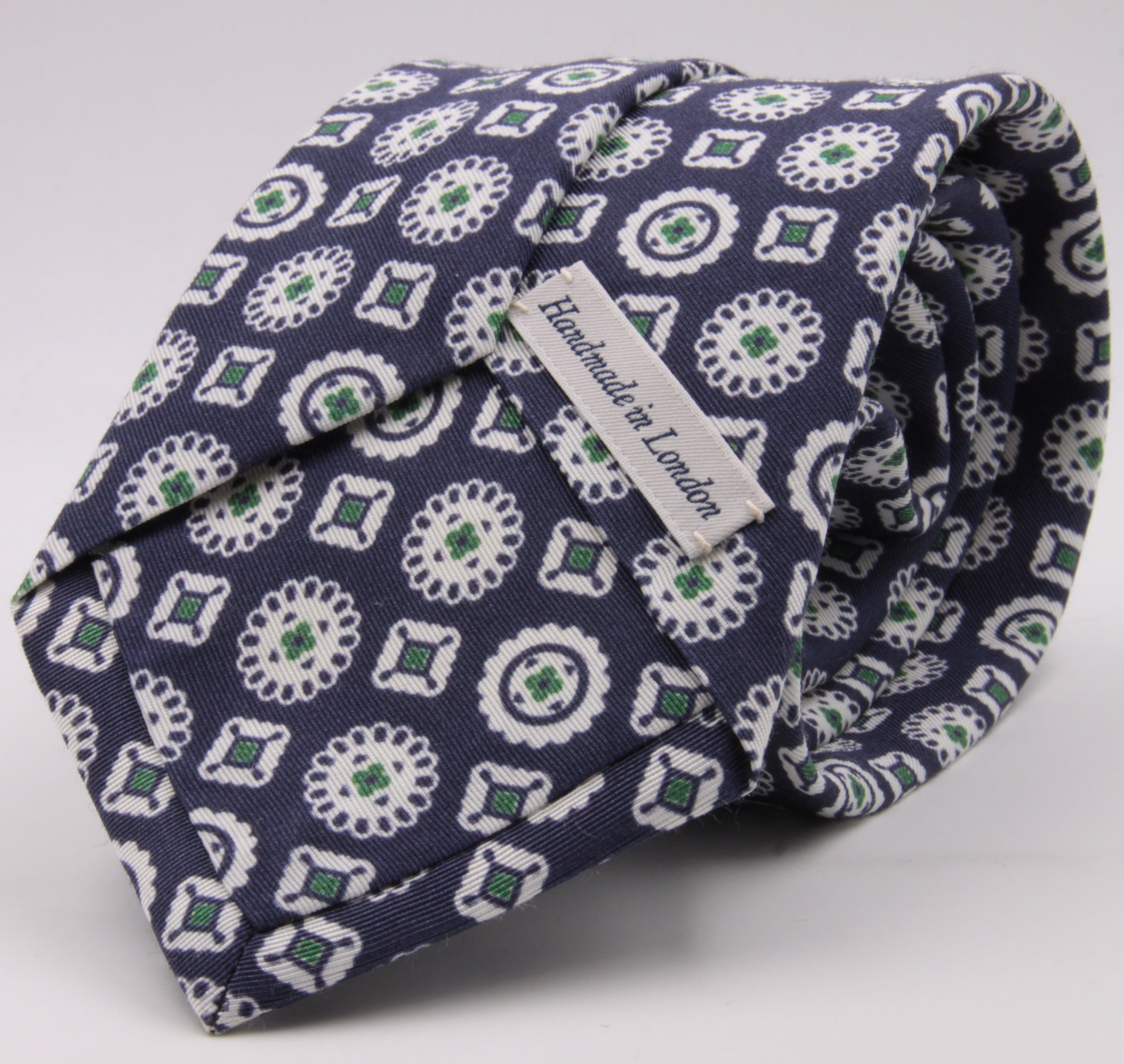 Drake's for Cruciani e Bella Printed 60% Silk 40% Cotton Self-Tipped Blue, Green and White Motif Tie  Handmade in London, England 8 cm x 149 cm #5423
