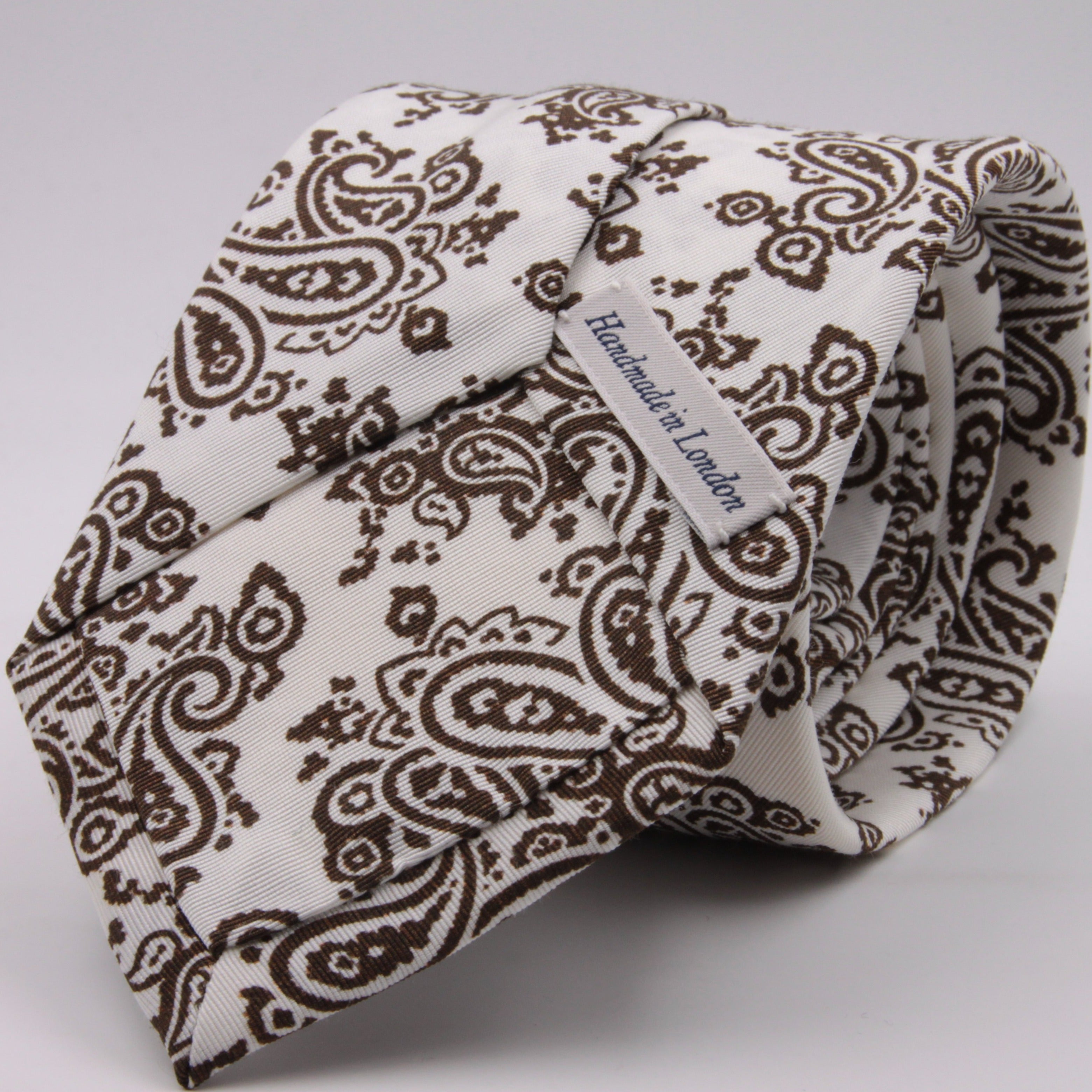 Drake's for Cruciani e Bella Printed 60% Silk 40% Cotton Self-Tipped Brown and White Paysley Motif Tie Handmade in London, England 8 cm x 149 cm #5411