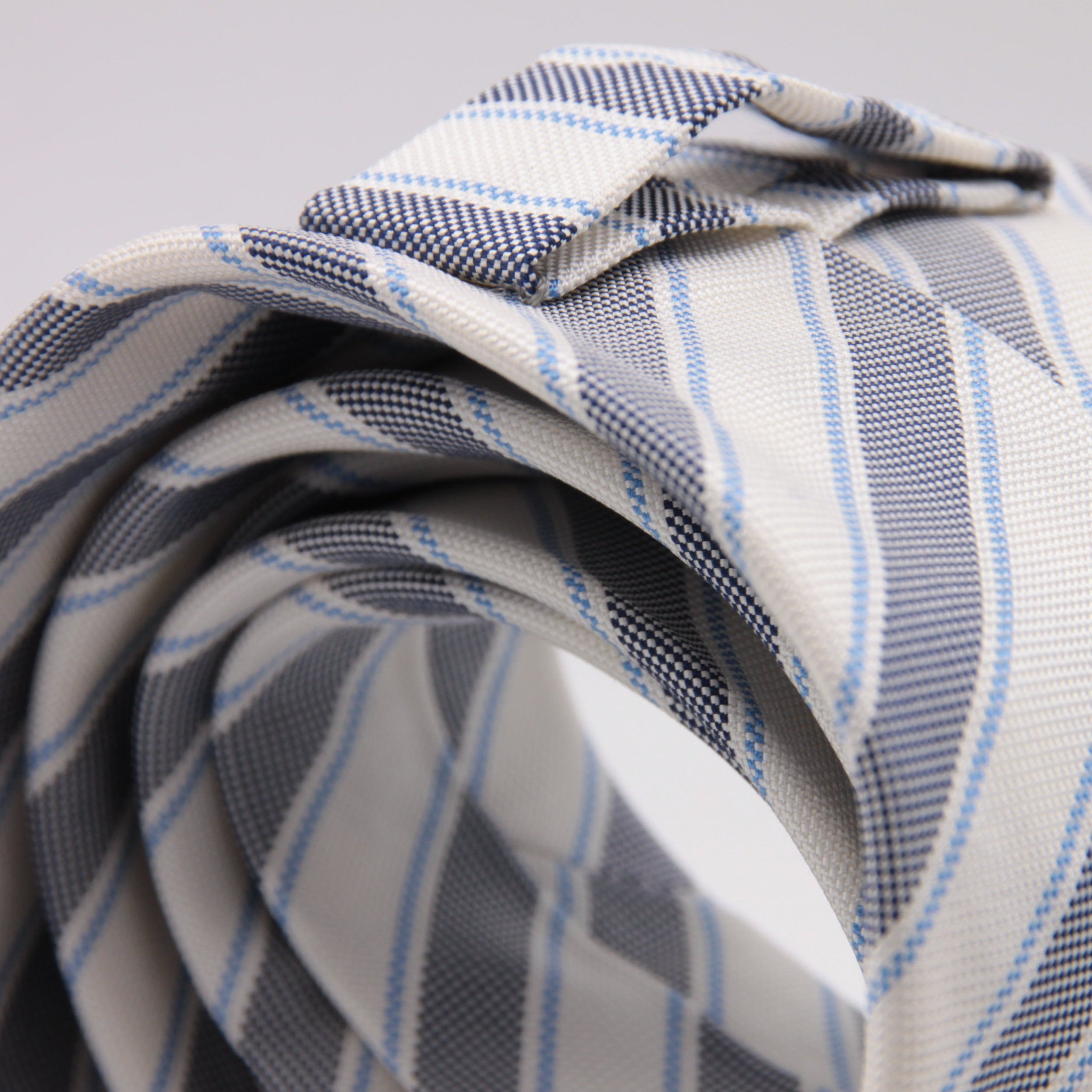 Drake's for Cruciani e Bella 100% Jacquard Silk Tipped Dark Blue, Light Blue and White stripe tie Handmade in London, England 8 cm x 150 cm #5266