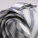 Drake's for Cruciani e Bella 100% Jacquard Silk Tipped Dark Blue, Light Blue and White stripe tie Handmade in London, England 8 cm x 150 cm #5266