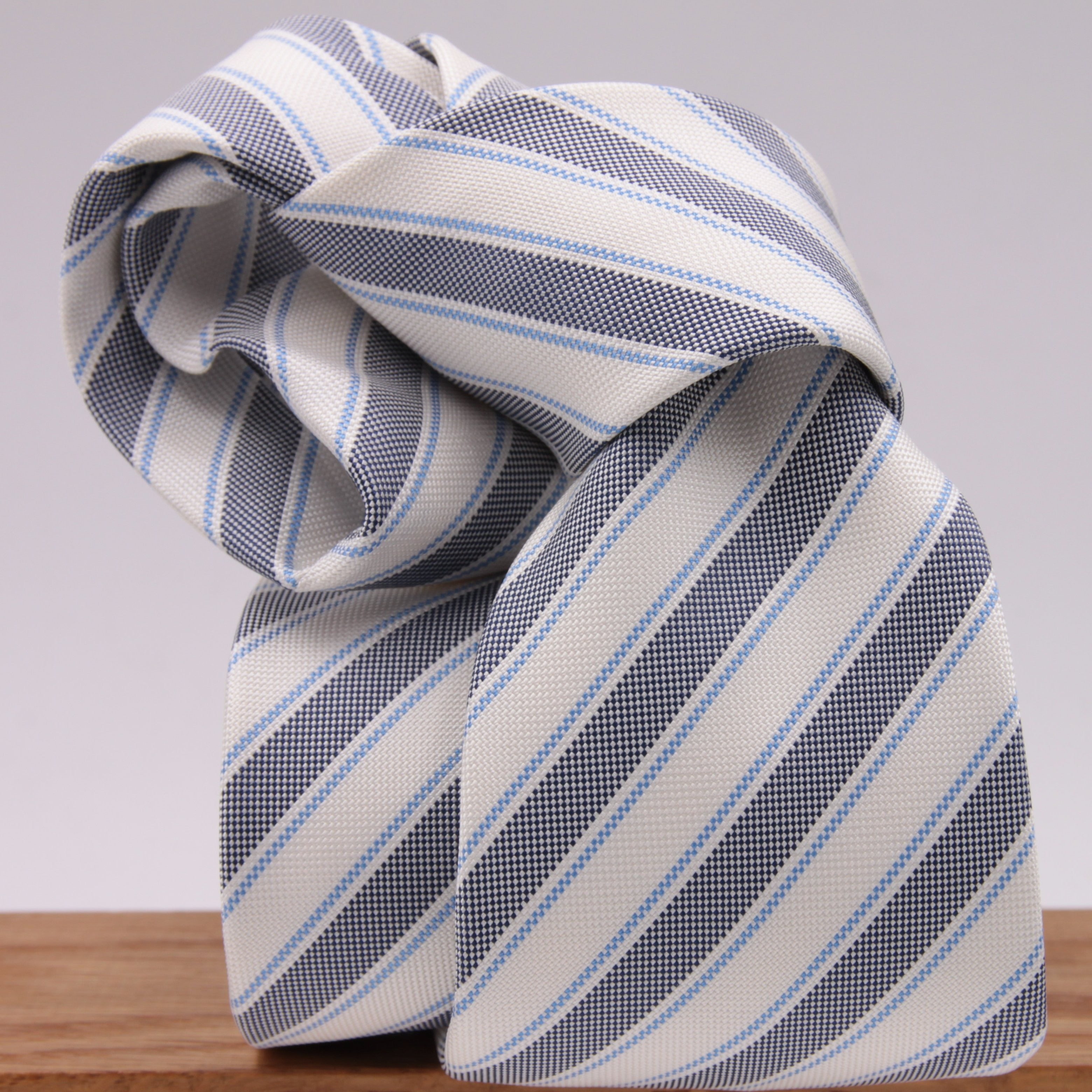 Drake's for Cruciani e Bella 100% Jacquard Silk Tipped Dark Blue, Light Blue and White stripe tie Handmade in London, England 8 cm x 150 cm #5266