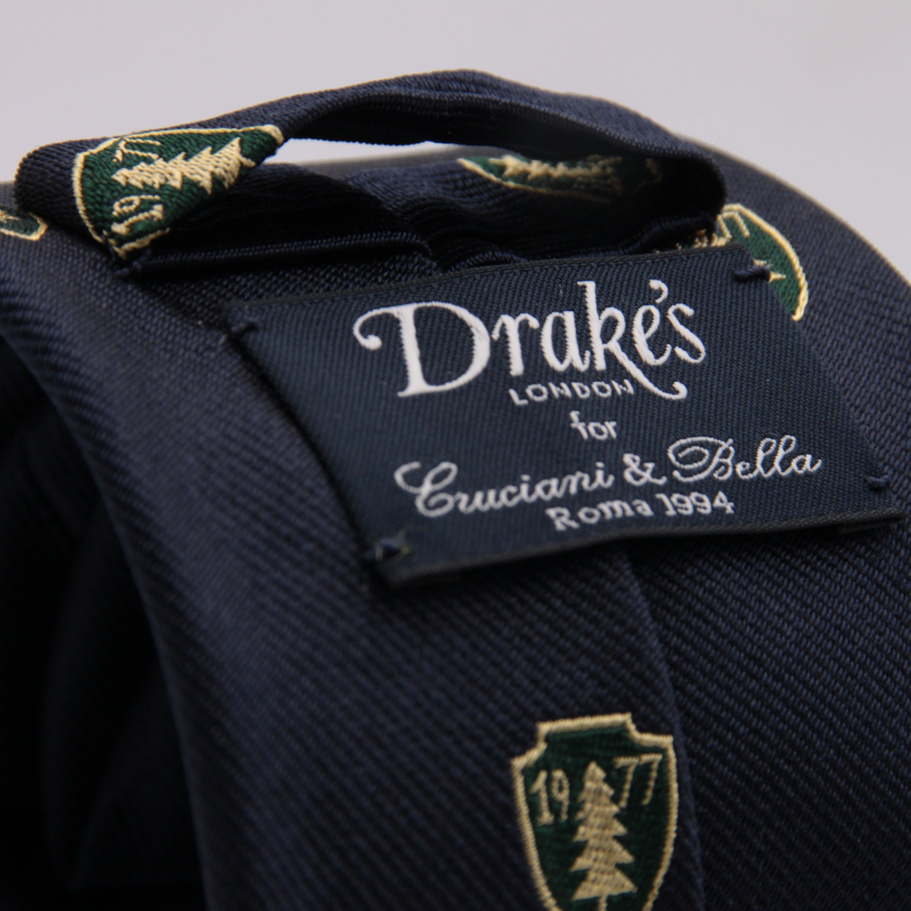 Drake's for Cruciani e Bella 100%  Woven Silk Tipped Blue, Green and Yellow Motif tie Handmade in London, England 8 cm x 150 cm #3652