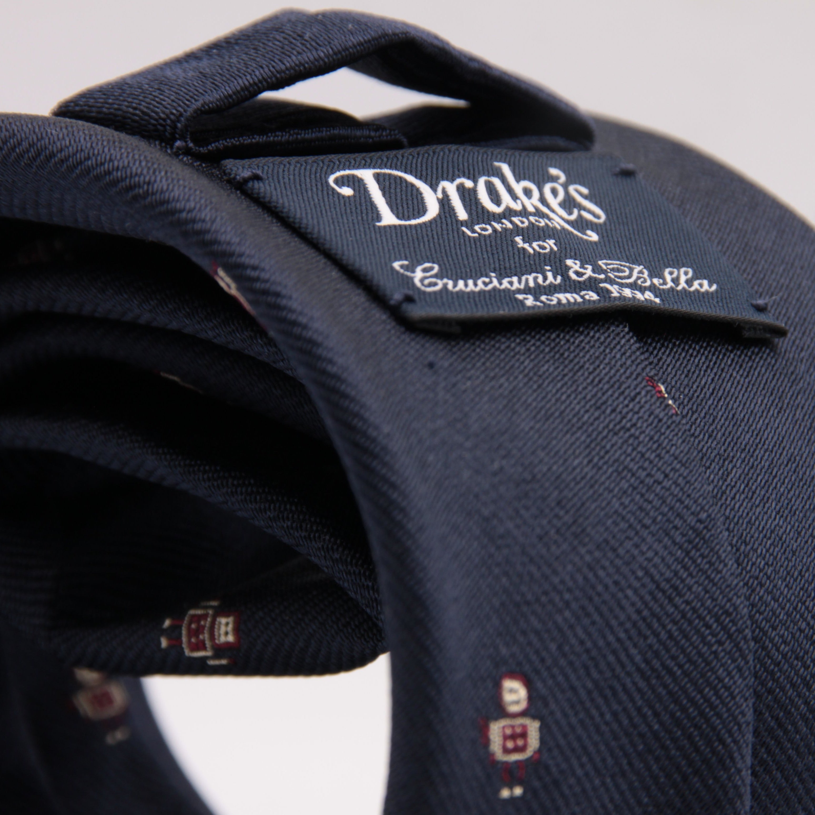 Drake's for Cruciani e Bella 100%  Woven Silk Tipped Blue, Wine and Yellow Robot Motif Tie Handmade in London, England 8 cm x 150 cm #5194