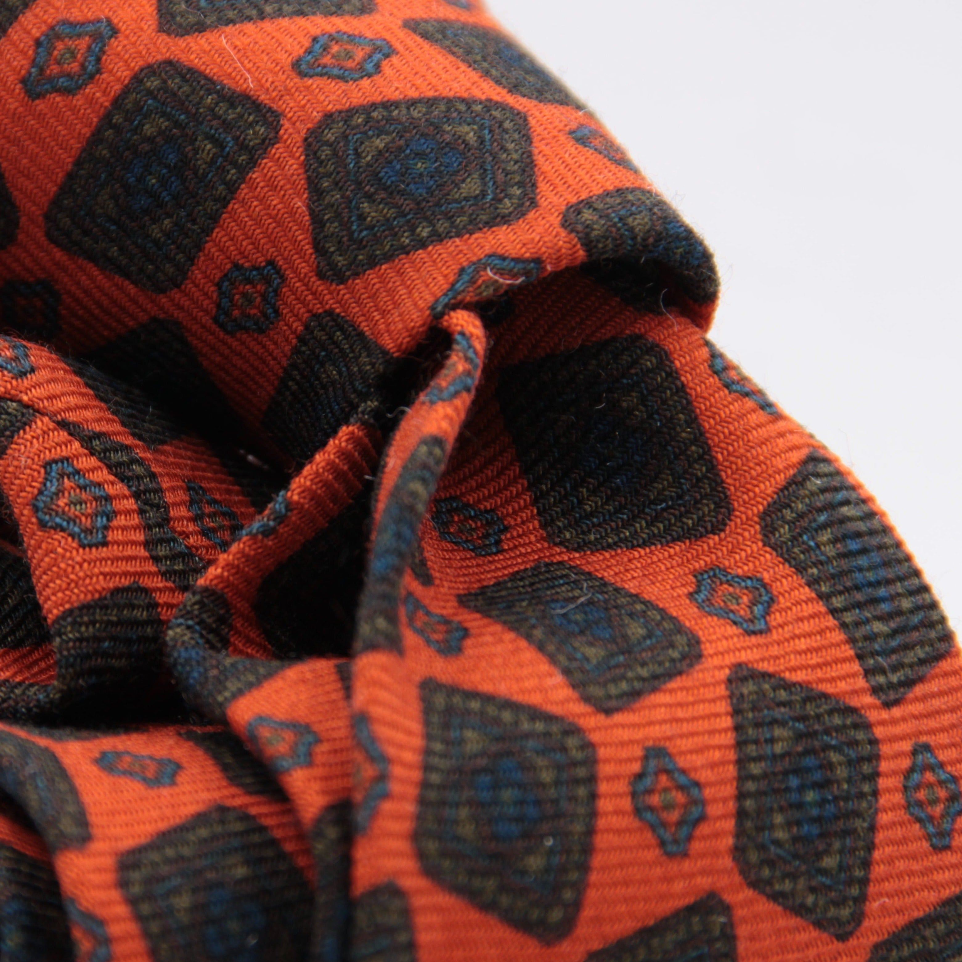 Cruciani & Bella 100%  Printed Wool  Unlined Hand rolled blades Orange, Green and Blue Motif Tie Handmade in Italy 8 cm x 150 cm #5990