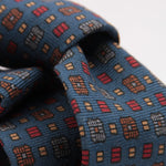 Cruciani & Bella 100%  Printed Wool  Unlined Hand rolled blades Blue, Grey, Orange and Red Motif Tie Handmade in Italy 8 cm x 150 cm #5979