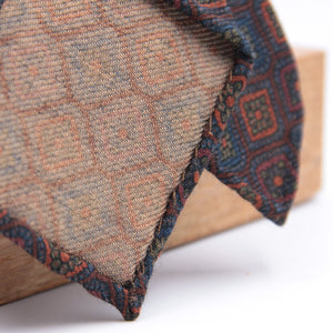 Cruciani & Bella 100%  Printed Wool  Unlined Hand rolled blades Brown, Blue and Orange Motif Tie Handmade in Italy 8 cm x 150 cm #6004