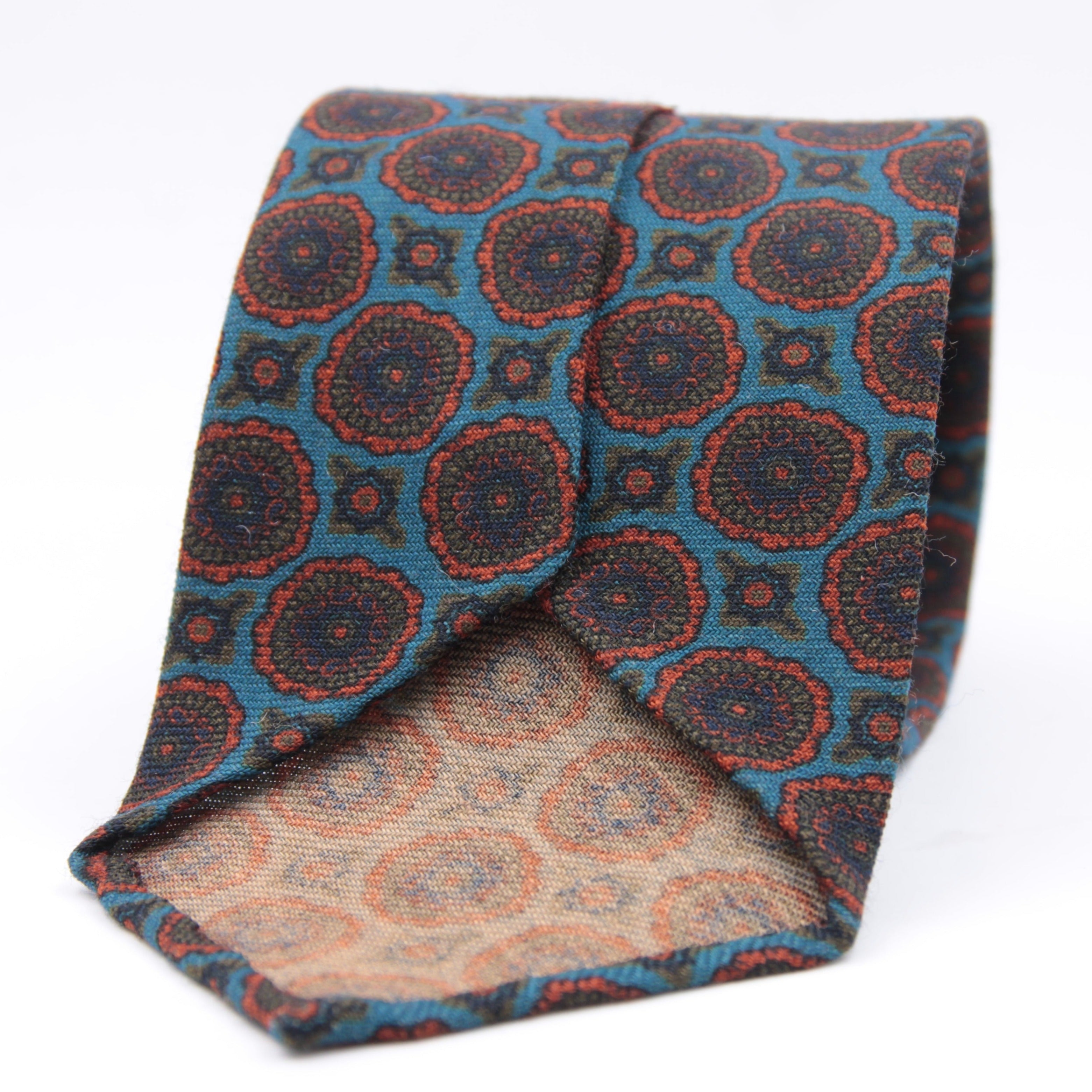 Cruciani & Bella 100%  Printed Wool  Unlined Hand rolled blades Light Blue, Orange and Green Motif Tie Handmade in Italy 8 cm x 150 cm #5973