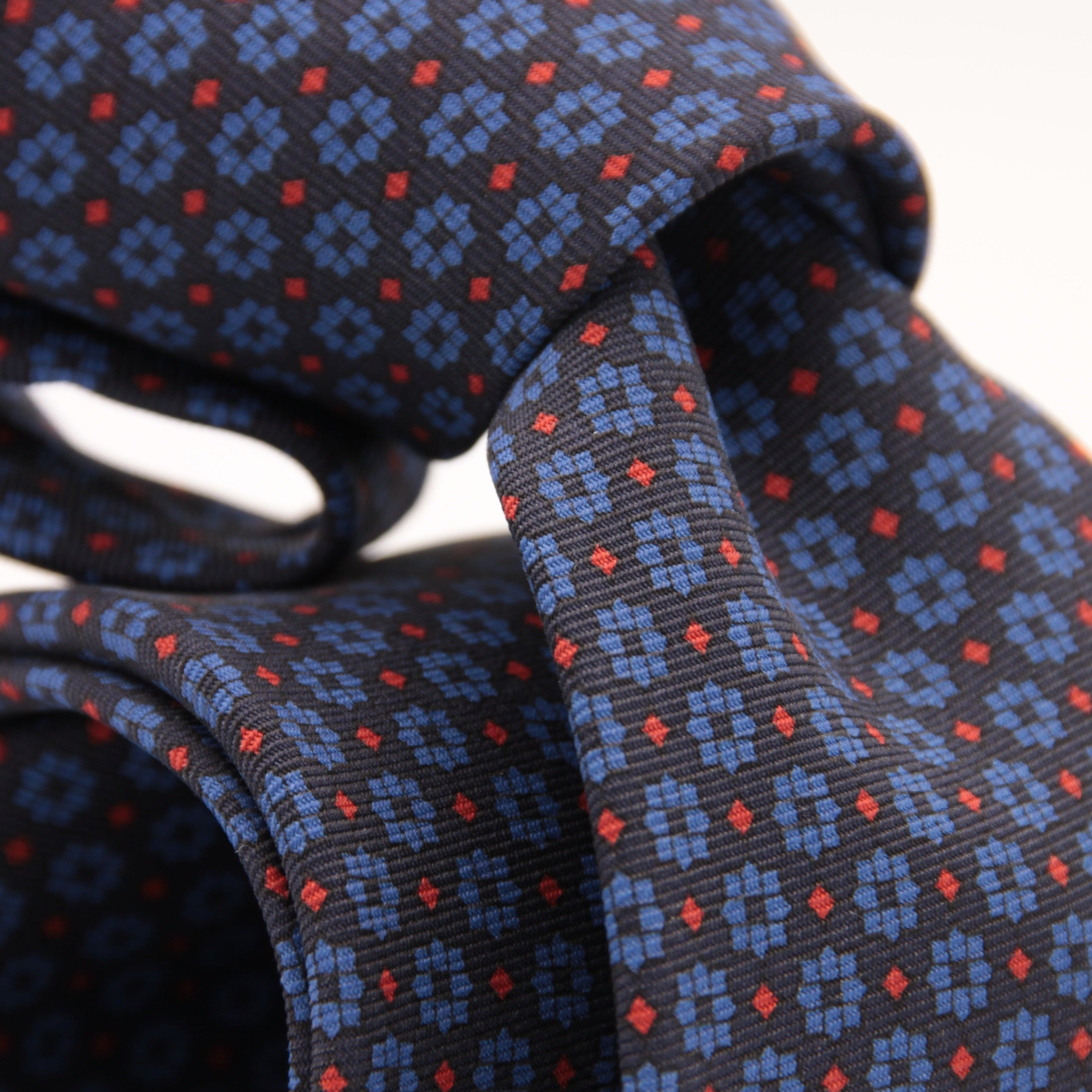 Holliday & Brown for Cruciani & Bella 100% printed Silk Self tipped Blue, Brown and Red motif tie Handmade in Italy 8 cm x 150 cm 5040