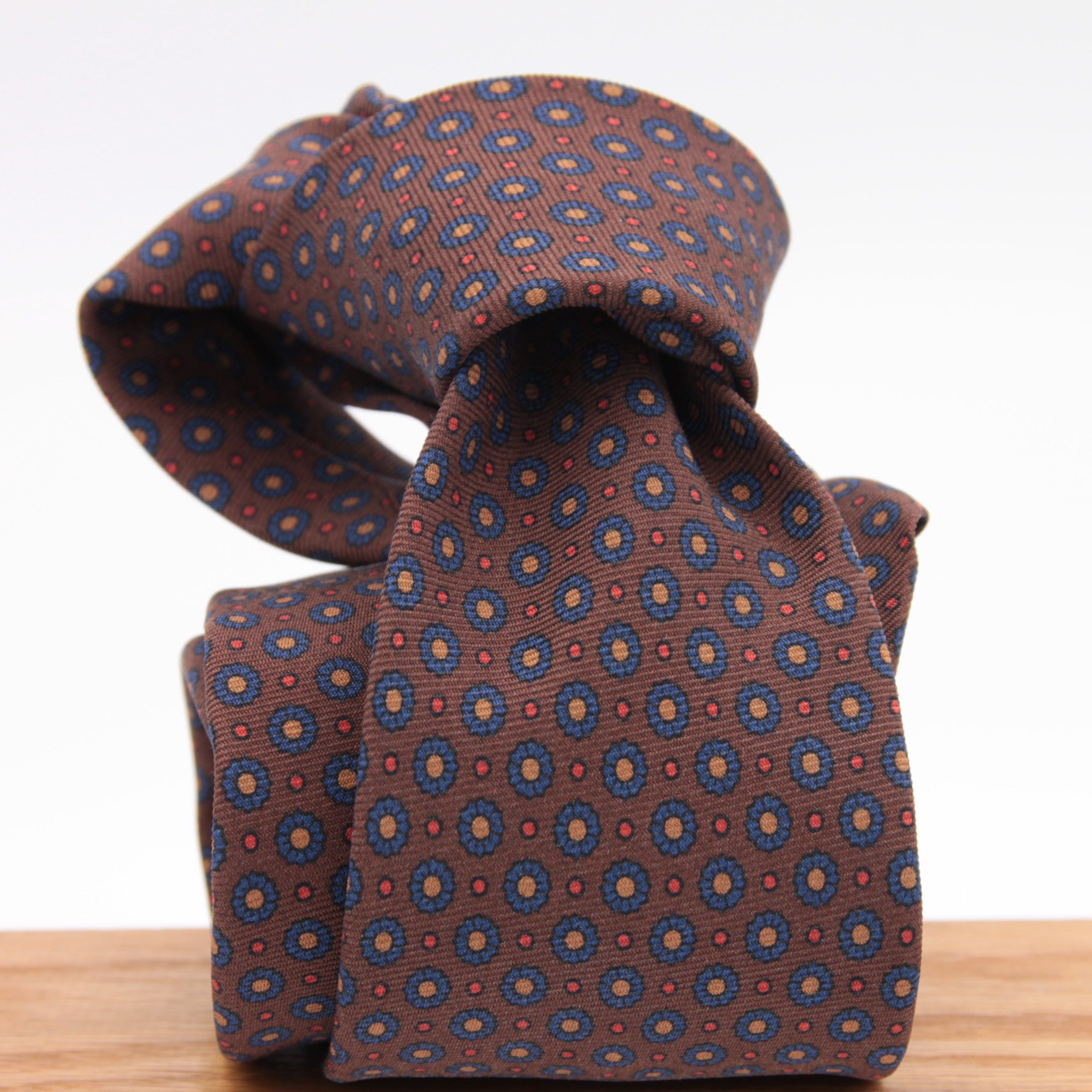 Holliday & Brown for Cruciani & Bella 100% printed Silk Self tipped Brown, Blue, Yellow and Red motif tie Handmade in Italy 8 cm x 150 cm 5036