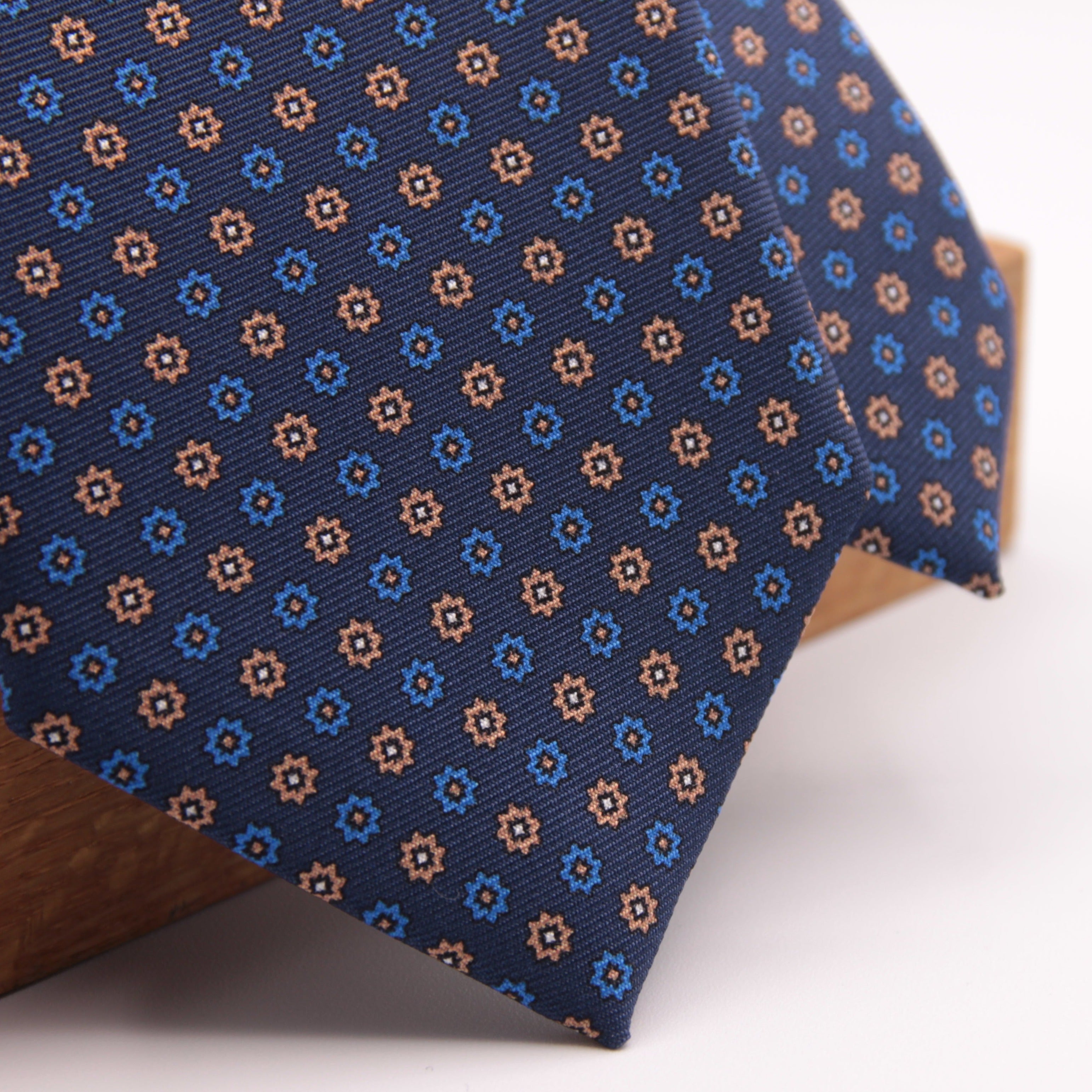Holliday & Brown for Cruciani & Bella 100% printed Silk Self tipped Blue, Light Blue, Brown and White motif tie Handmade in Italy 8 cm x 150 cm