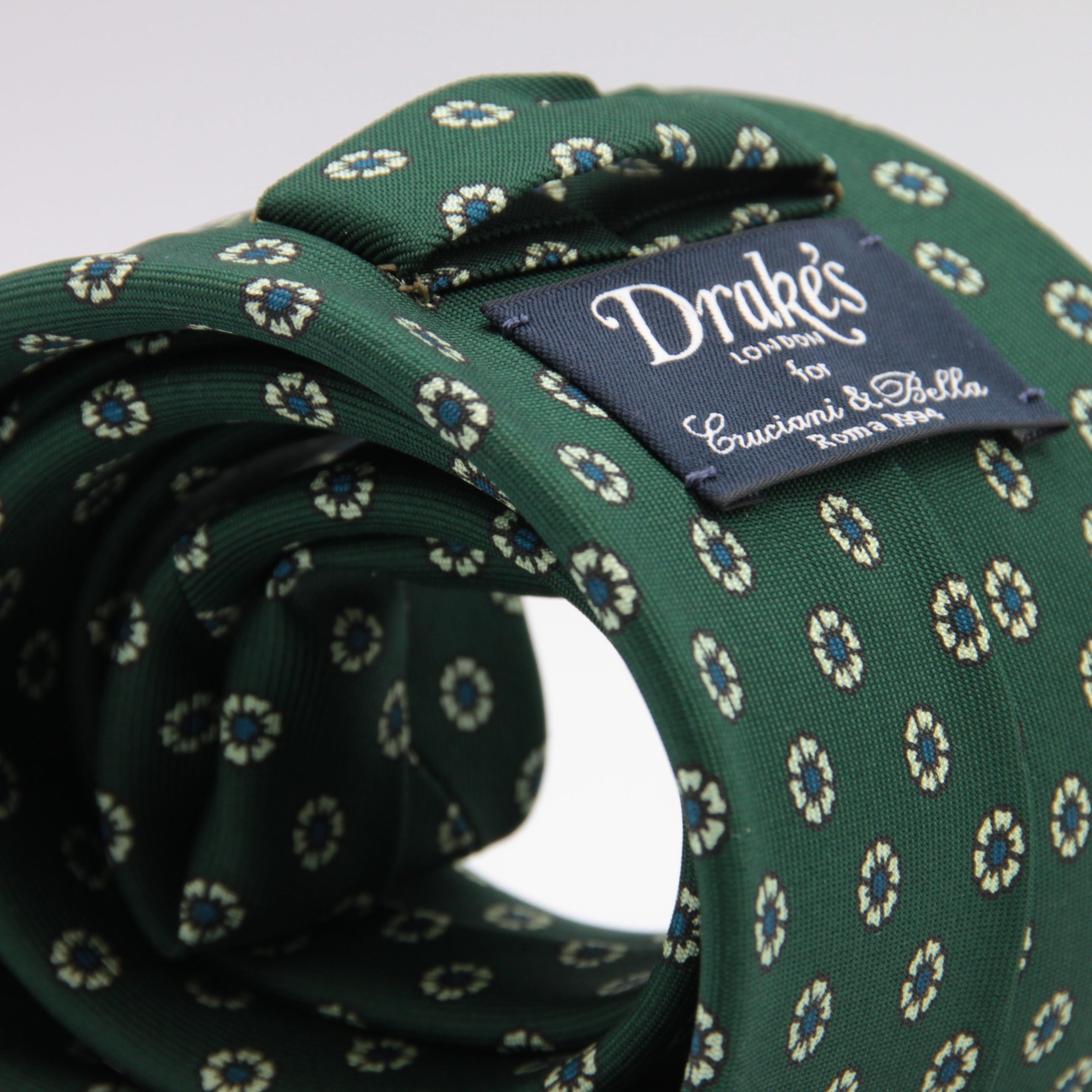 Drake's for Cruciani & Bella 36 oz Self-Tipped 100% Printed Silk Green, White and Blue Motif Tie Handmade in London. England 9 cm x 150 cm #3851