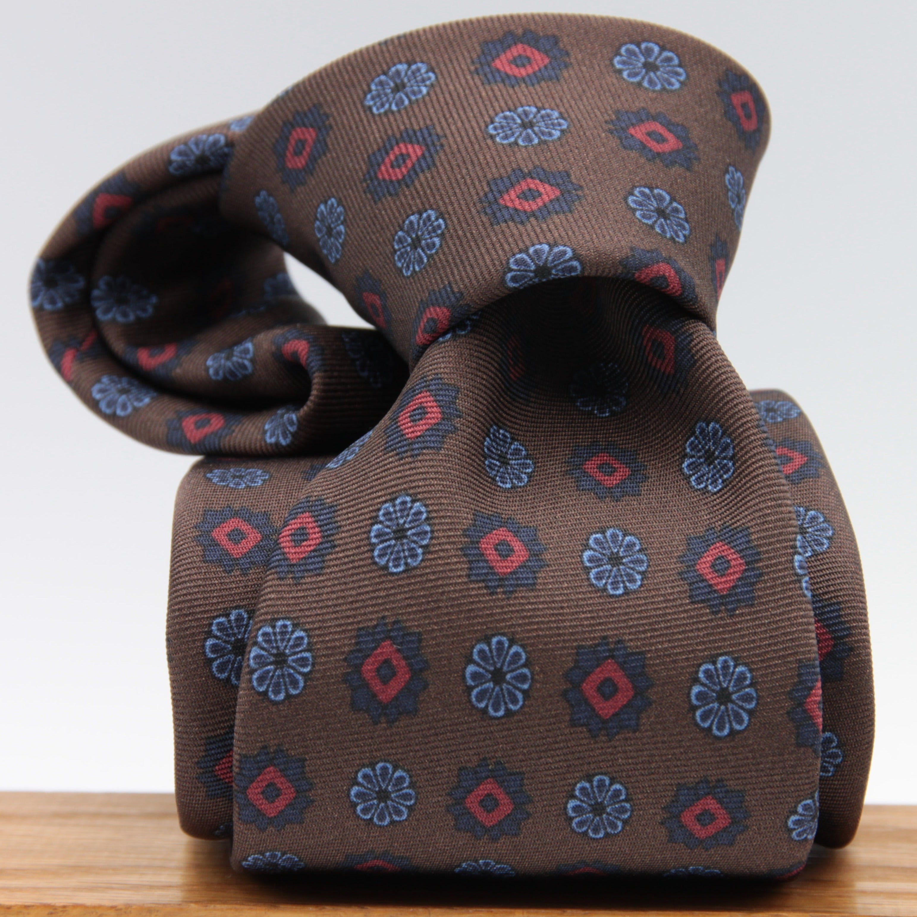 Holliday & Brown for Cruciani & Bella 100% printed Silk Self tipped Brown, Blue and Red motif tie Handmade in Italy 8 cm x 150 cm #6992