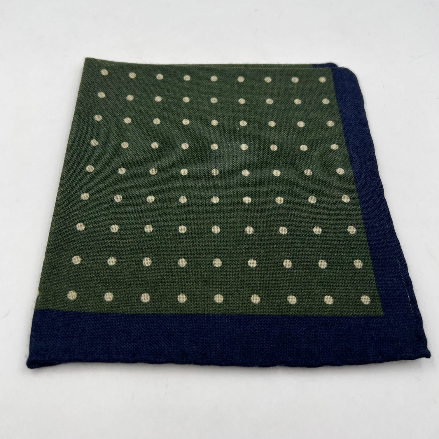 Holliday & Brown Hand-rolled   Holliday & Brown for Cruciani & Bella 89% Wool 11% Silk Green, Blue and Cream Dots  Motif  Pocket Square Handmade in Italy 31 cm X 31 cm #0513