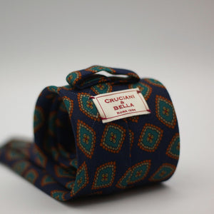 Cruciani & Bella 100%  Printed Wool  Unlined Hand rolled blades Dark Blue, Green, Orange and light beige Motif Tie  Handmade in Italy 8 cm x 150 cm #7296