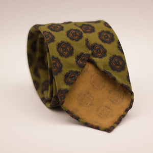 Cruciani & Bella 100%  Printed Wool  Unlined Hand rolled blades Green, Brown, Beige and Blue  Motifs Tie Handmade in Italy 8 cm x 150 cm #7507