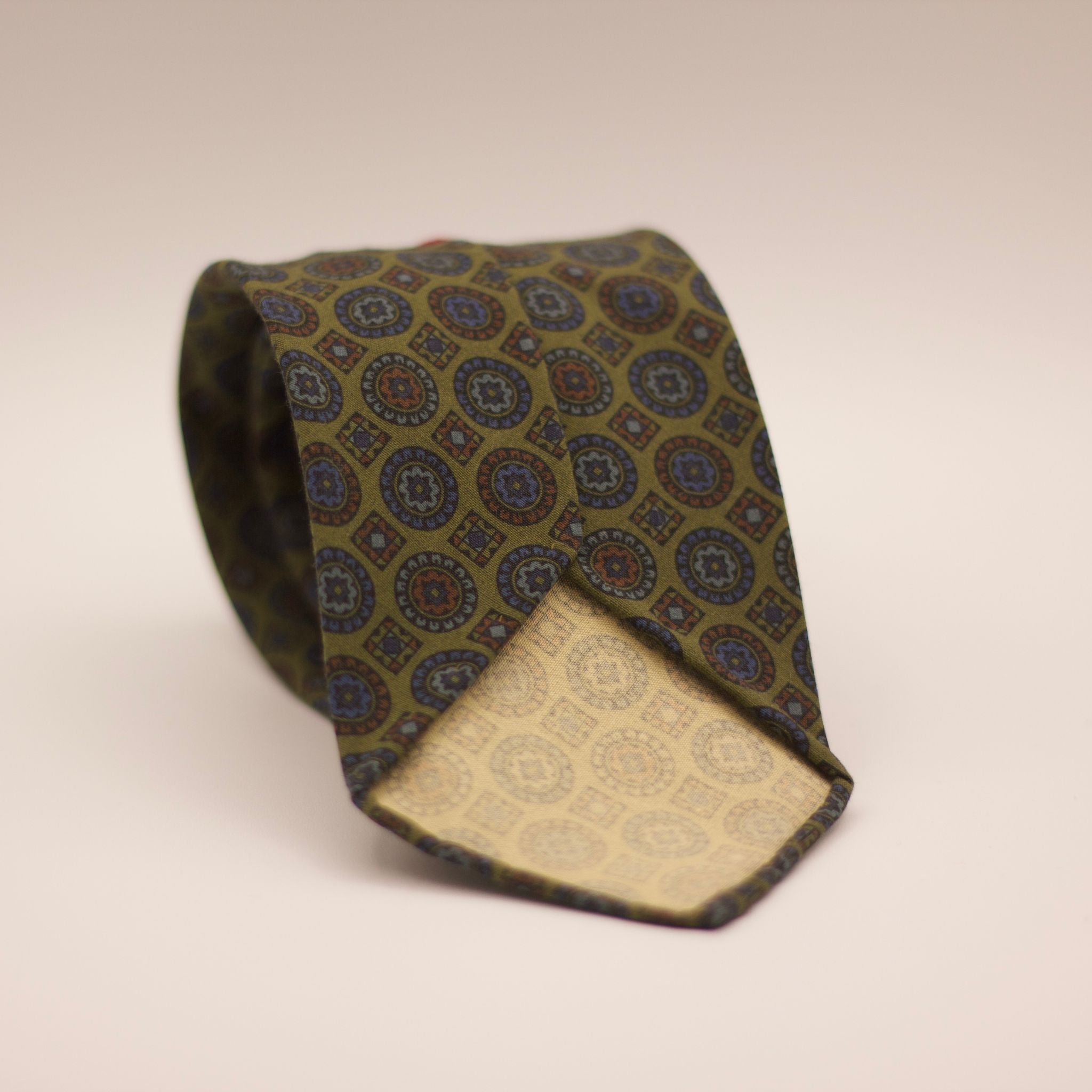 Cruciani & Bella  100% Printed Madder Silk  Italian fabric  Unlined tie Green, Blue, Light Blue and Orange motif  8 cm x 150 cm #7501