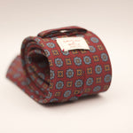 Cruciani & Bella  100% Printed Madder Silk  Italian fabric  Unlined tie Dark Red, Light Brown and light blue motif  8 cm x 150 cm #7502
