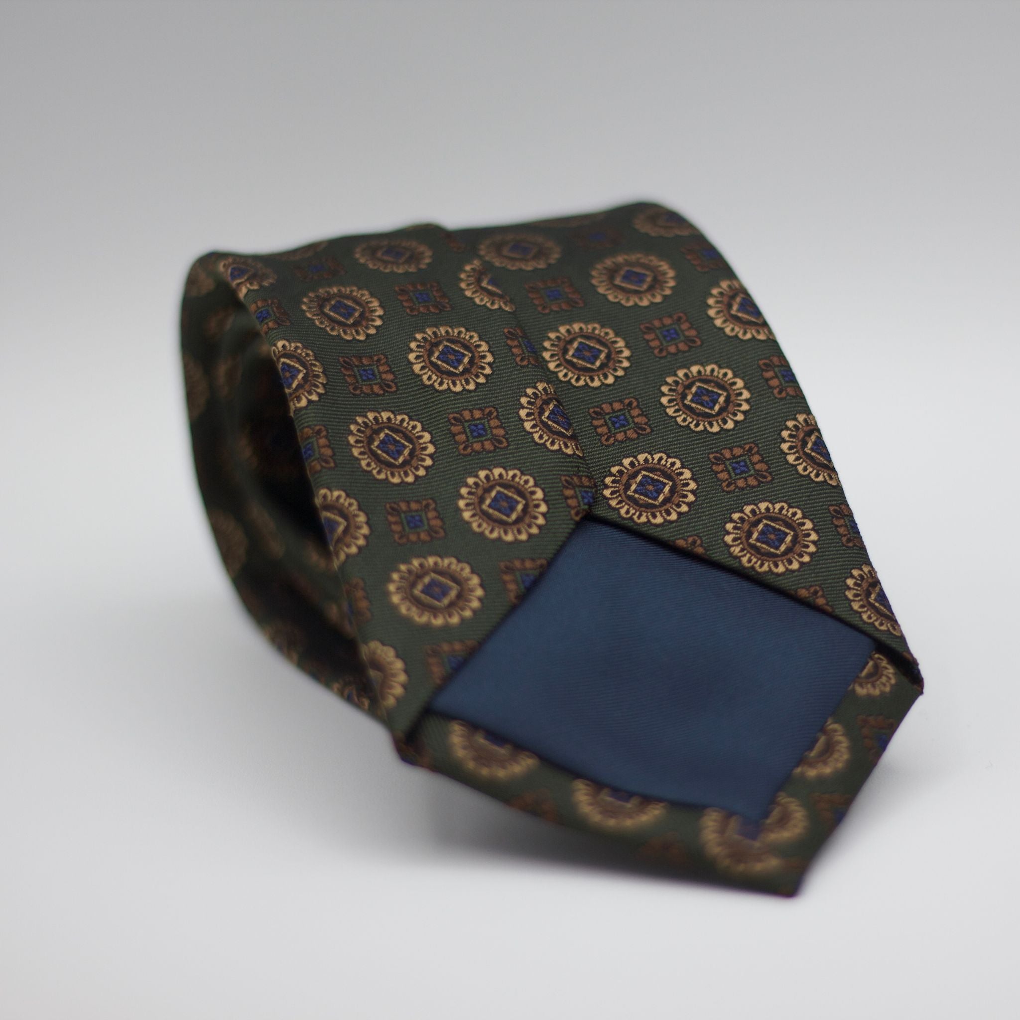 Holliday & Brown for Cruciani & Bella 100% Woven Jacquard Silk Tipped Green with Blue, Brown and Gold motif tie  Handmade in Italy 8 cm x 150 cm #7005