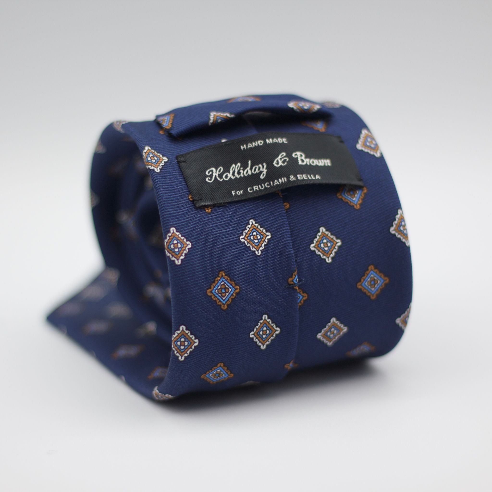 Holliday & Brown for Cruciani & Bella 100% printed Silk Self Tipped Blue, with White, Brown and Light Blue motif tie  Handmade in Italy 8 cm x 150 cm #6338
